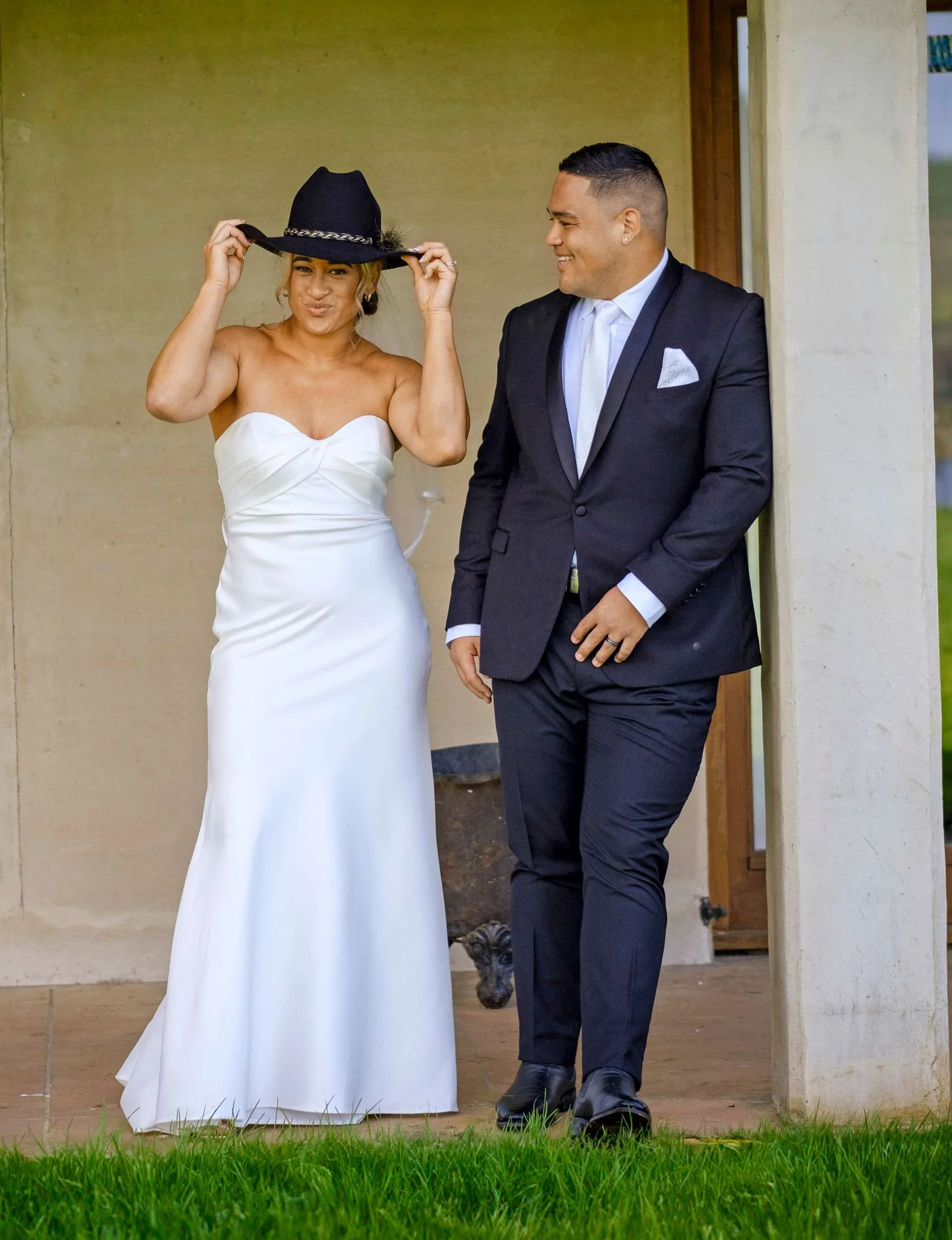 Kennedy wearing Solly's hat after their wedding