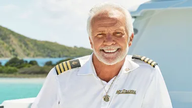 Captain Lee smiling on his boat