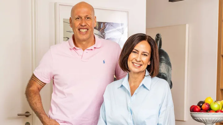 Jane and Paul in their kitchen together