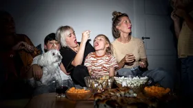 Family eating popcorn