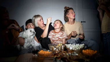 Family eating popcorn
