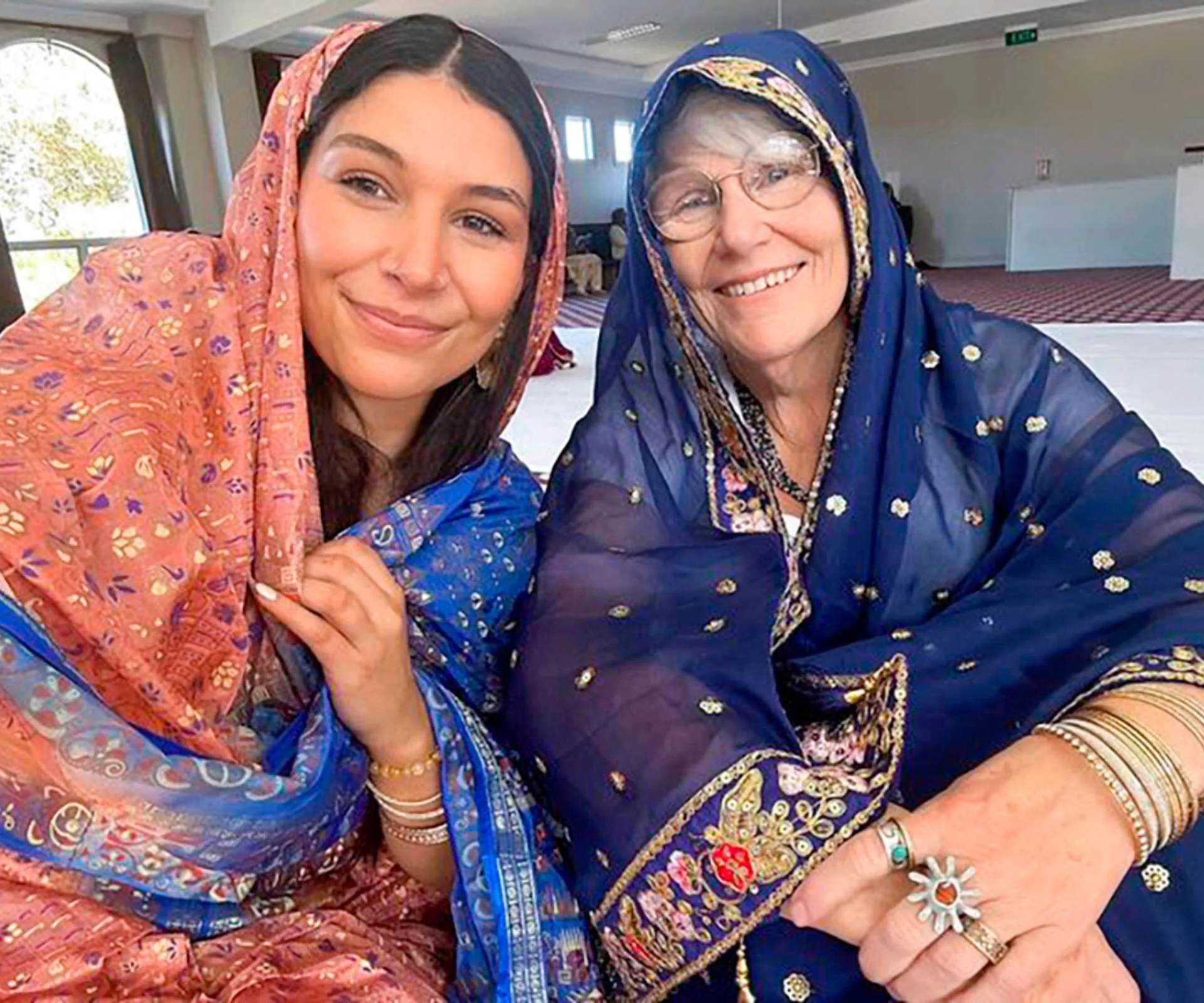 Zazi and her mum in traditional Indian outfits when visiting for her multiple sclerosis treatment