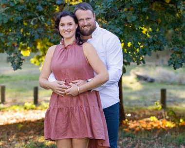 Tom and Dana Walsh holding Dana's belly