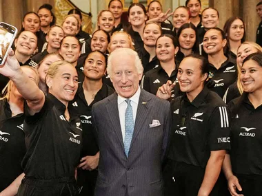 The Black Ferns taking a group selfie with King Charles