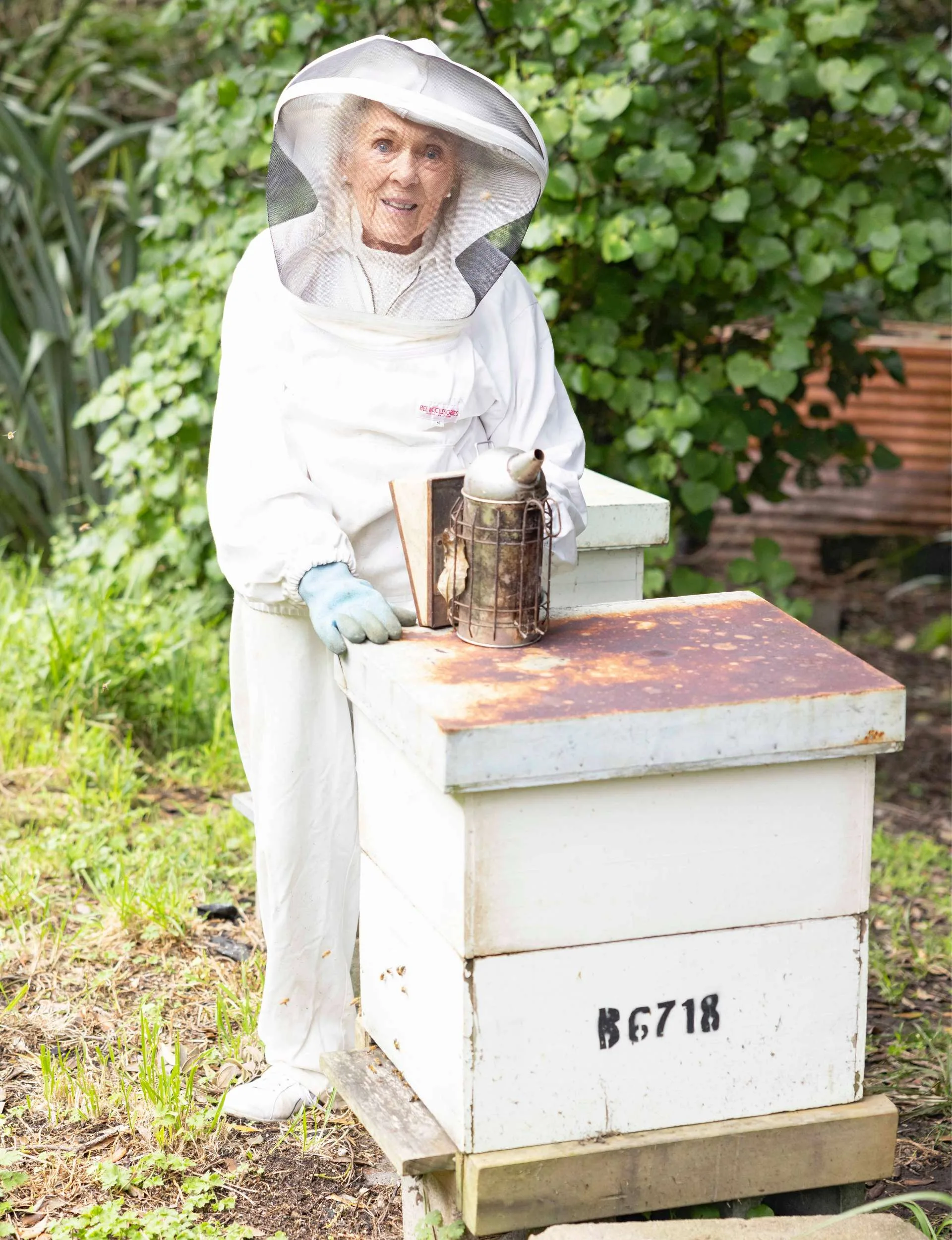 Olivia Sheehan with her beehive boxes