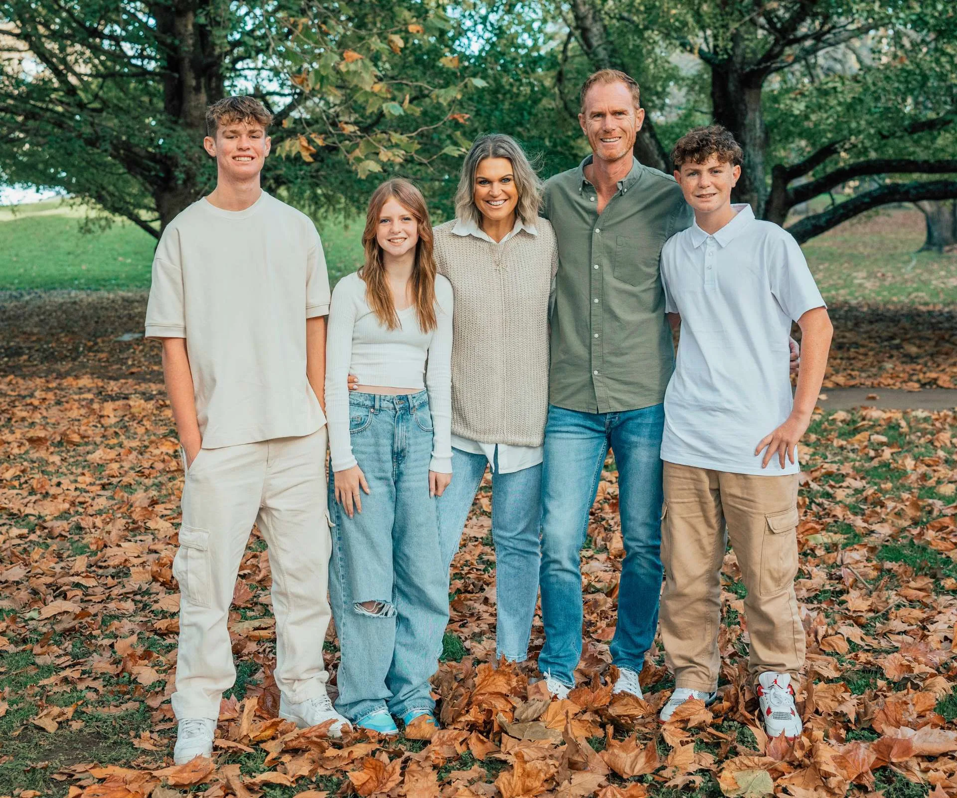 Anna Paterson with her family in an autumnal park