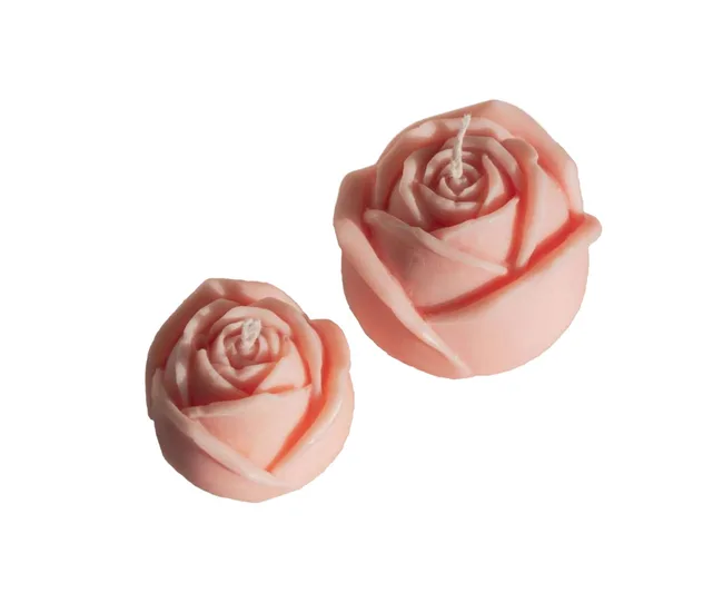 Two rose-shaped candles make for good Secret Santa gifts