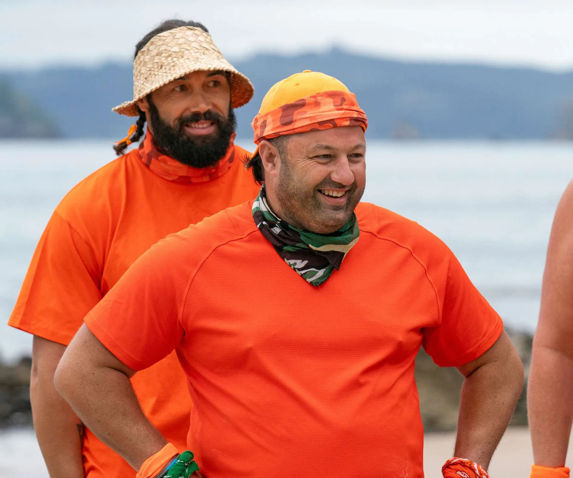 Duncan standing in front of teammate Wairangi on Celebrity Treasure Island