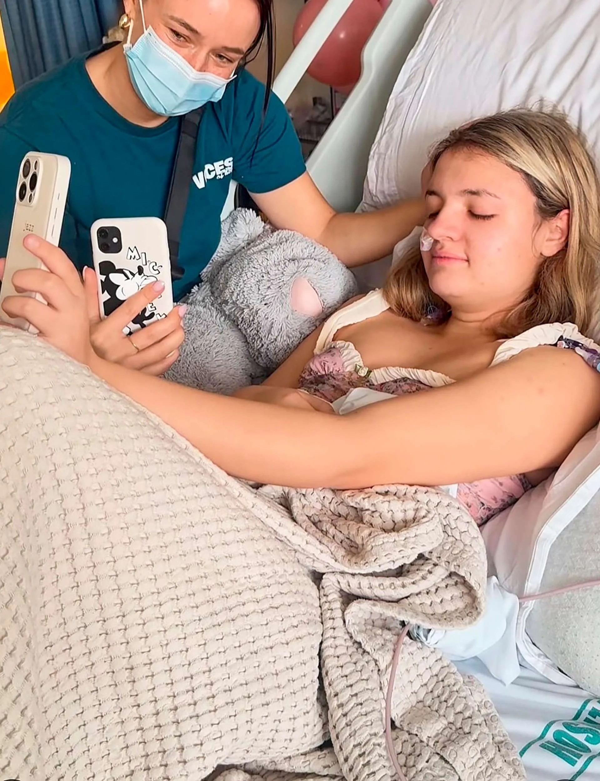 Jazz Thornton beside Eva Mitchell's hospital bed