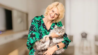 Caro McCourtie holding a cat