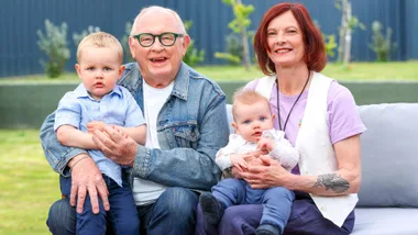 Kevin Milne with his wife and grandchildren