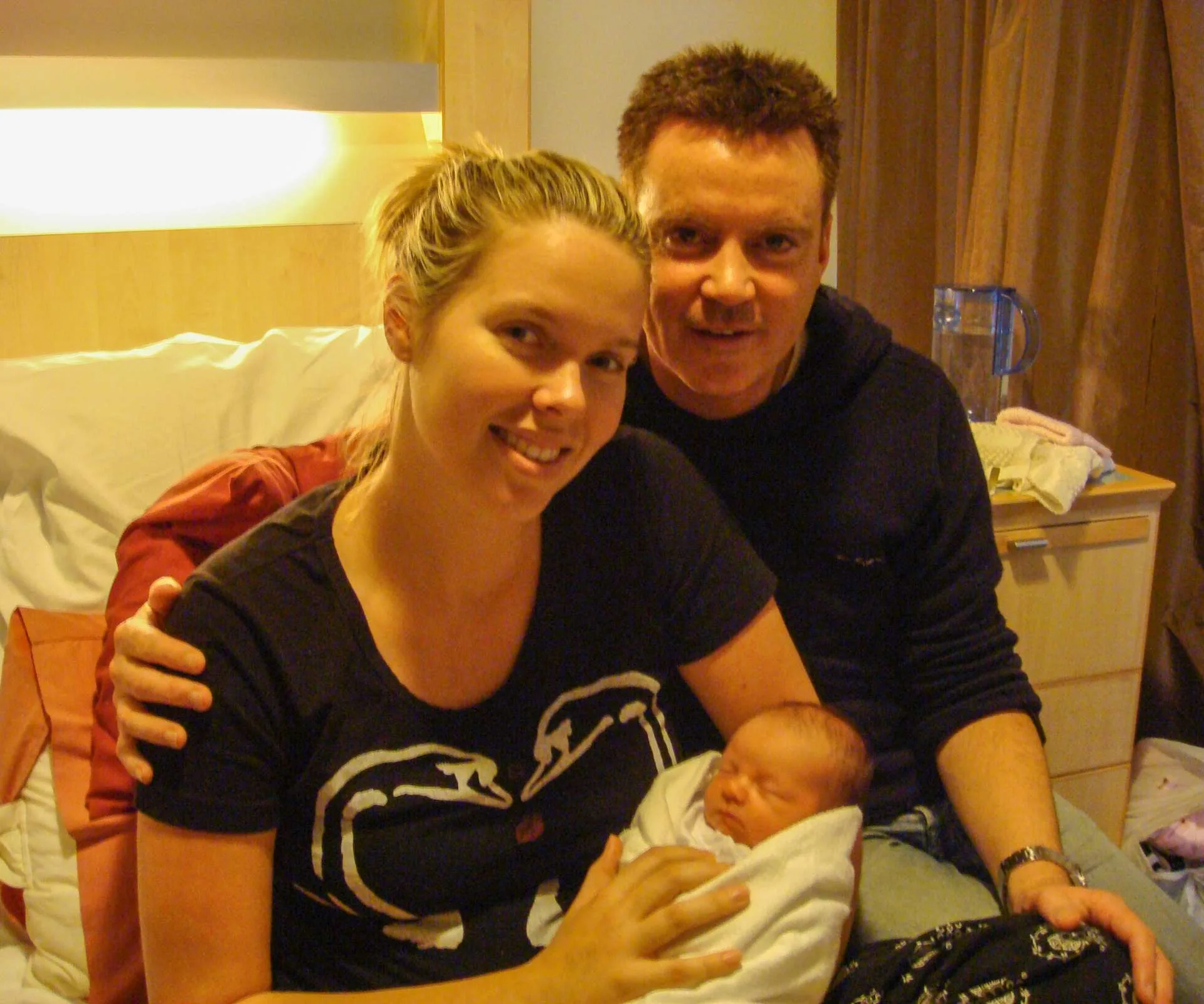 Heather Keats and husband Steve with new-born baby Emma in the hospital