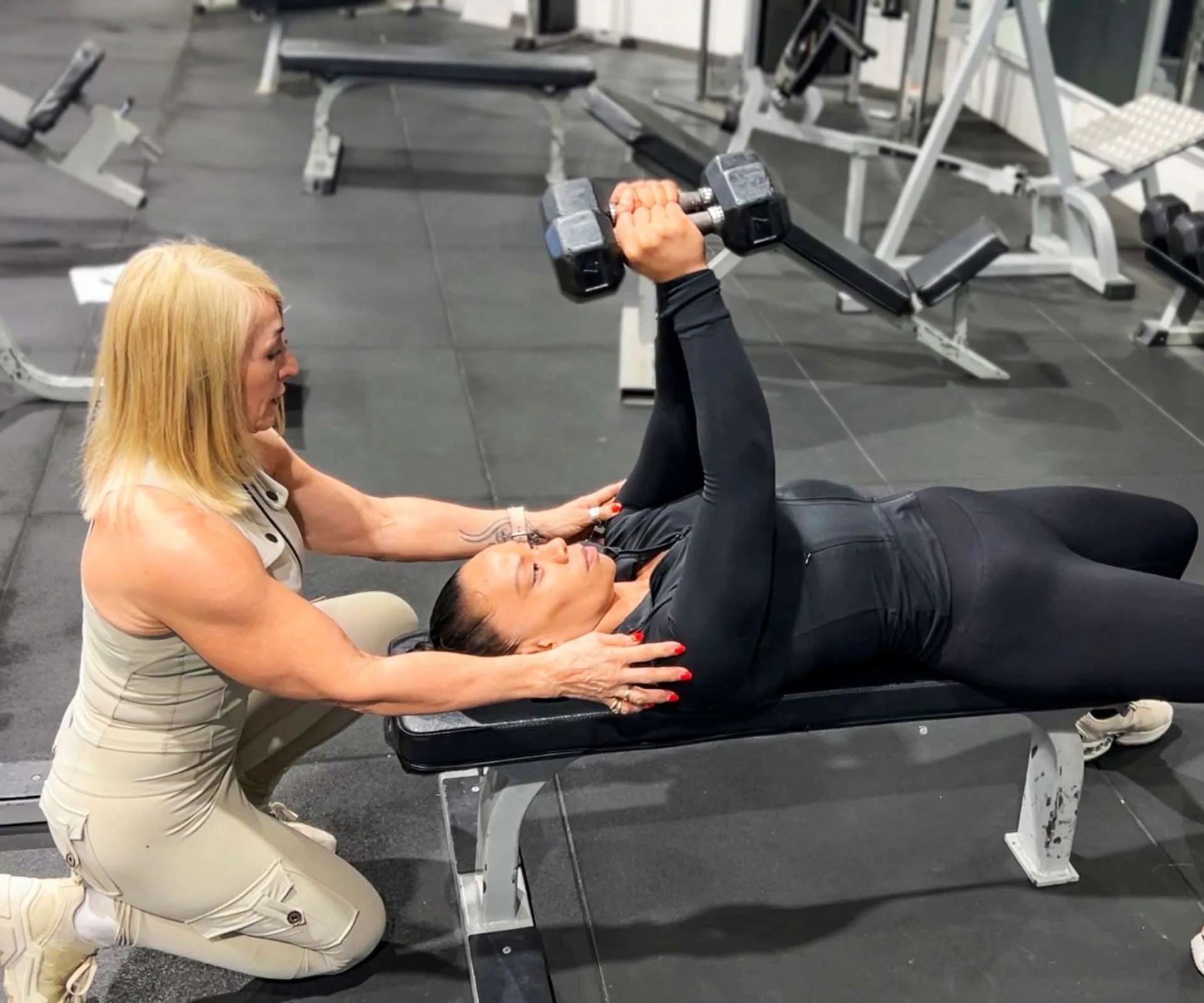 Meripa in the gym with her trainer