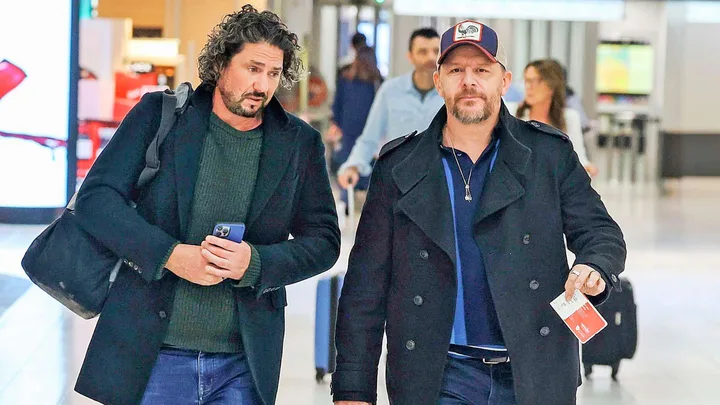 MKR judges Manu and Colin walking through an airport together