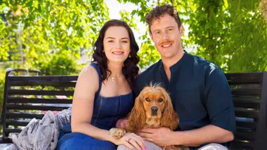 Holly Robinson with her fiancé Geoff and their puppy