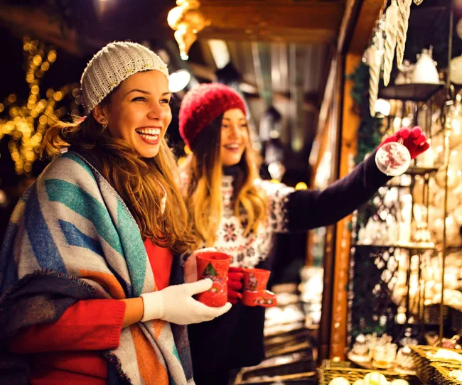 Two girls at the Christmas markets in Vienna