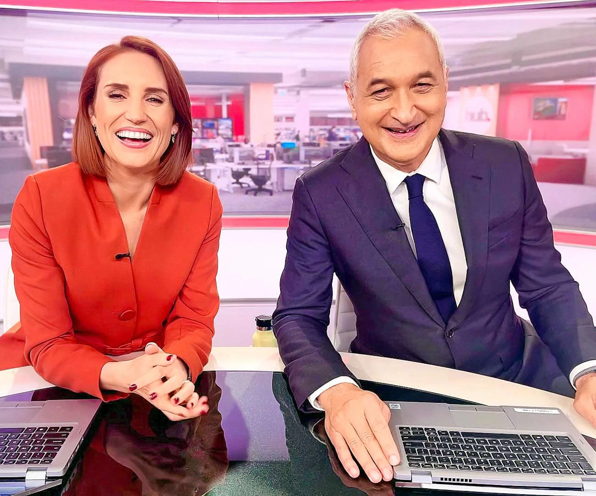Samantha Hayes laughing with Mike McRoberts on air
