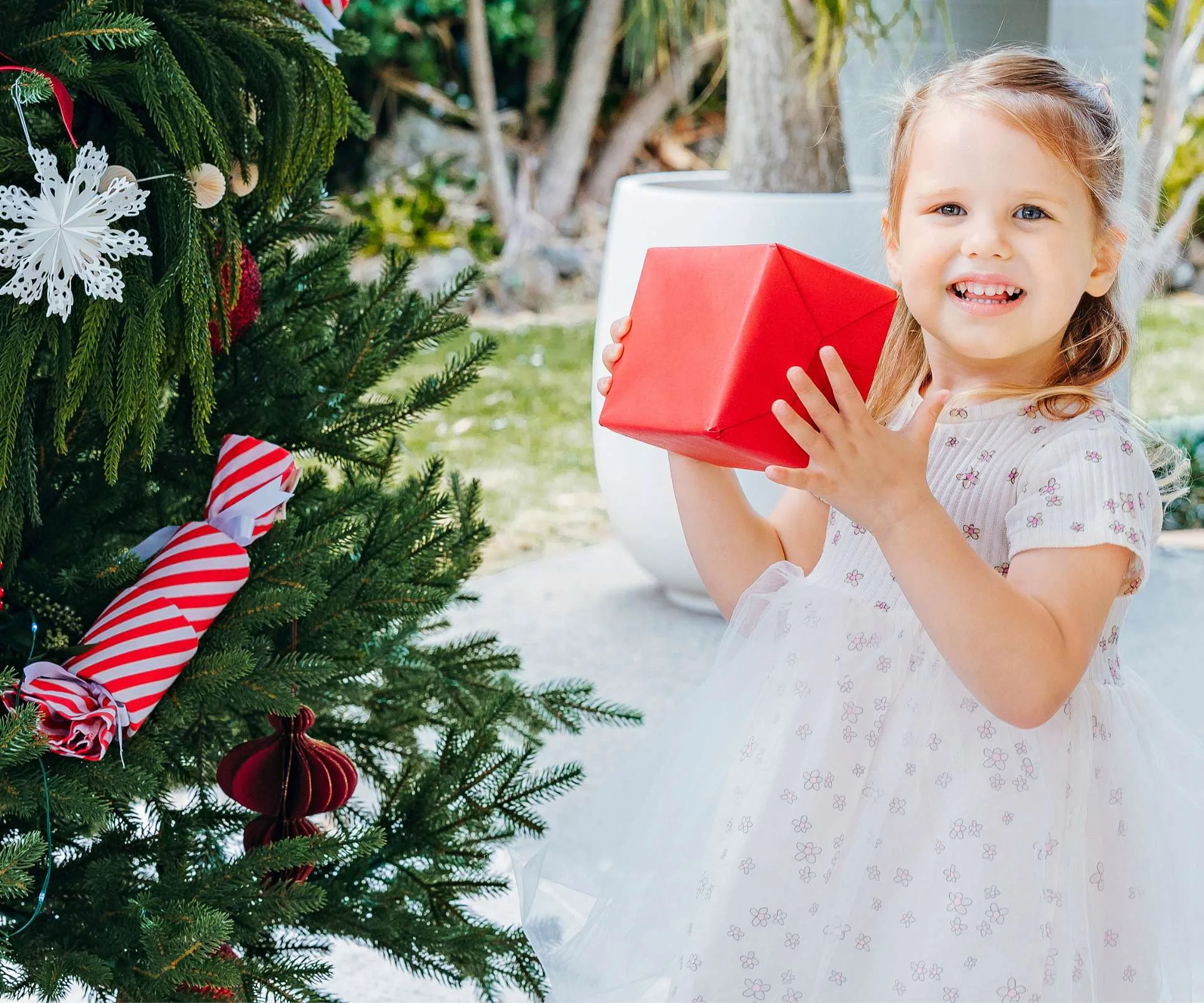 Amaya playing with a gift