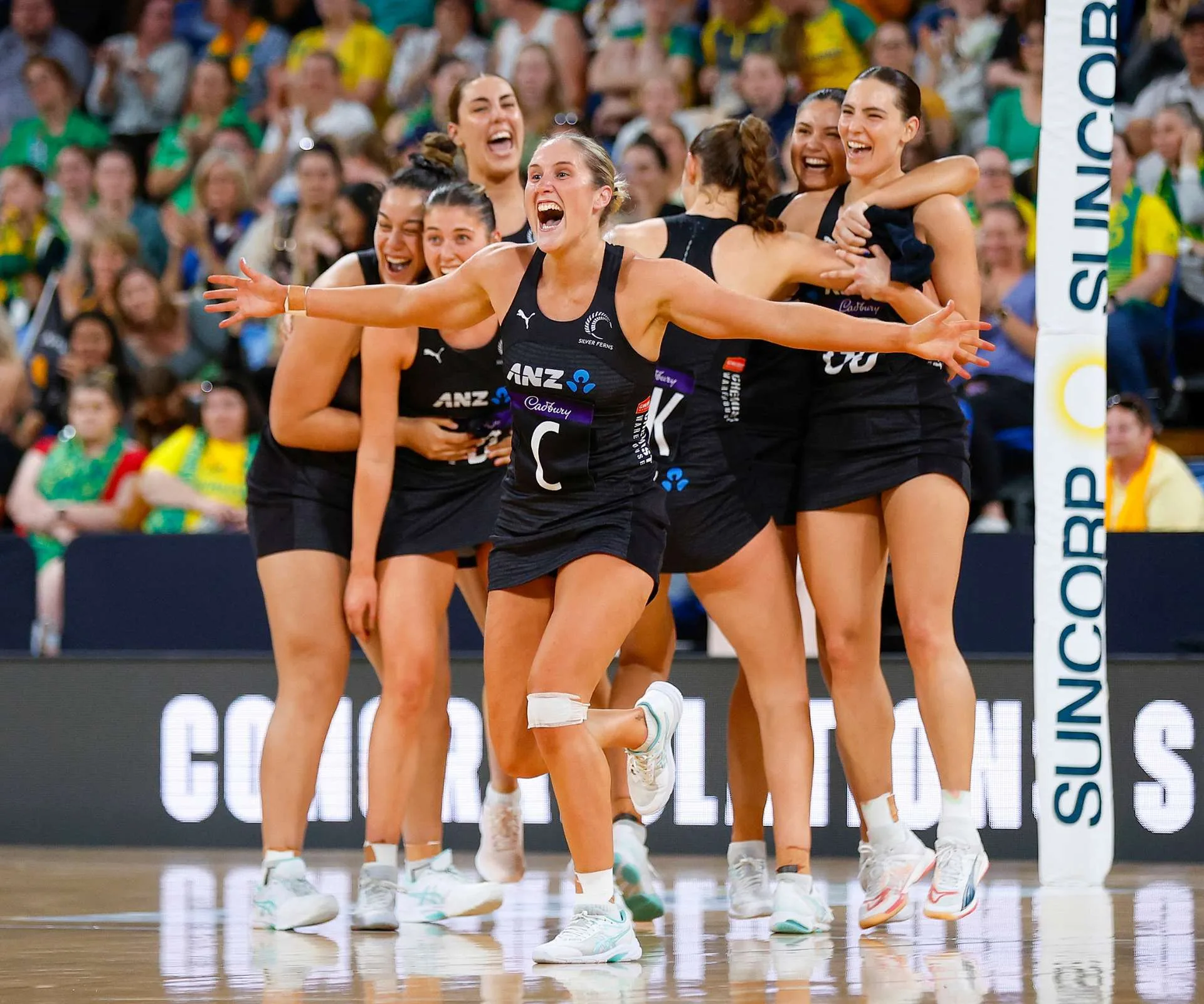 The Silver Ferns celebrating their win
