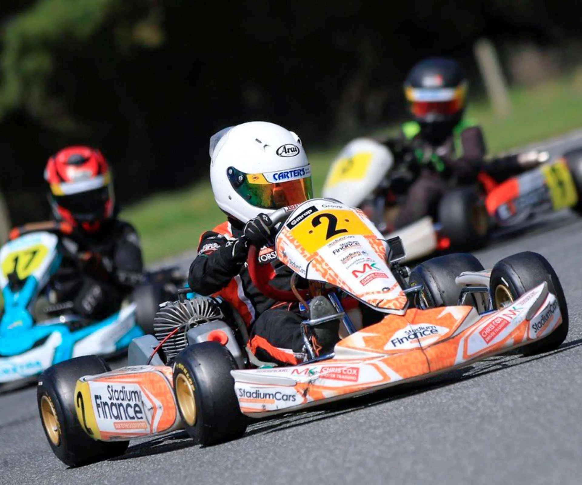 Louis racing go-karts as a kid
