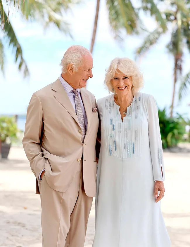 King Charles and Queen Camilla on beach