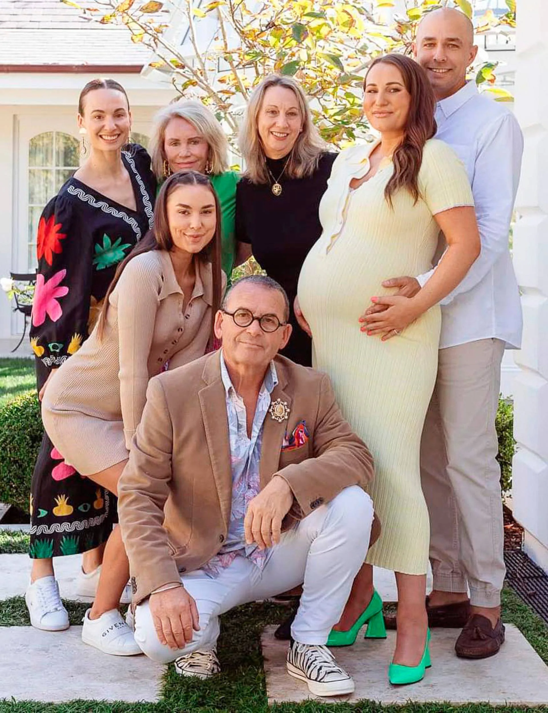 Bella and Julyan with Bella's family while she was heavily pregnant