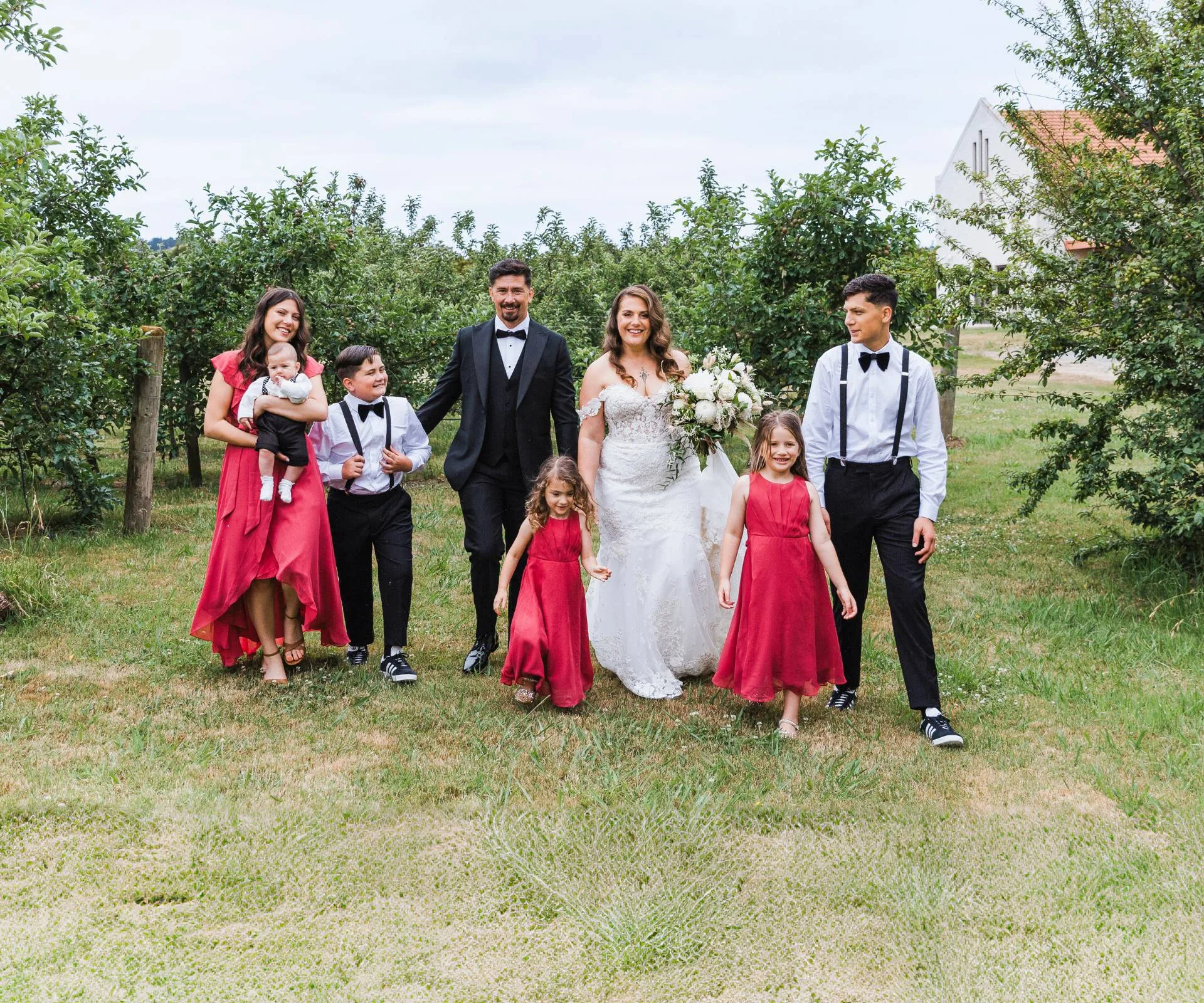 K’Lee McNabb with her husband Lama Saga and their kids at their wedding