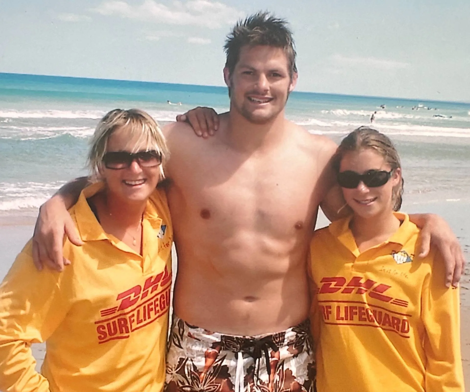 Brodie, Richie and Brodie's colleague on the beach