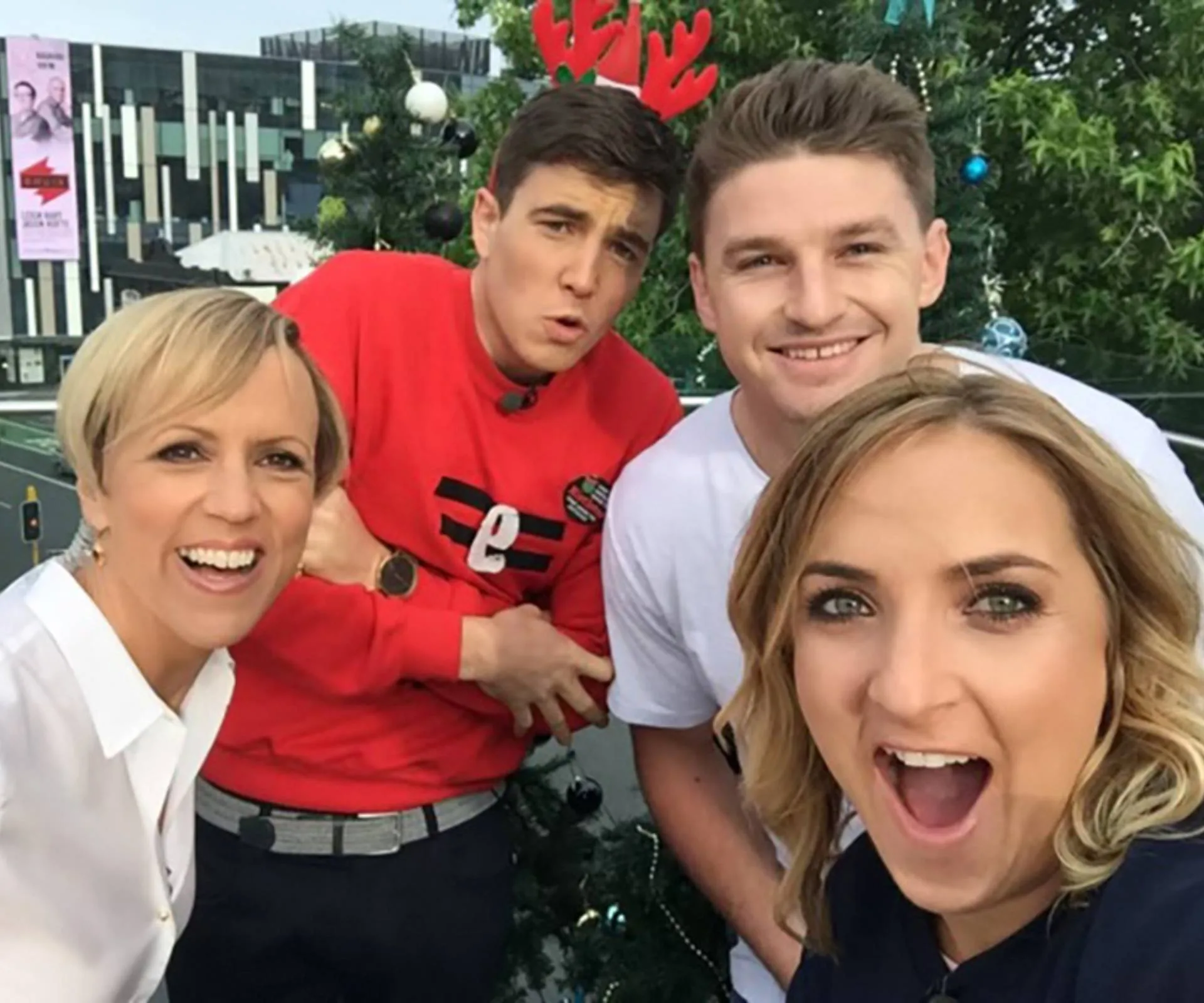 Brodie with fellow newsmakers Hilary Barry and Jack Tame, and All Black Beauden Barrett