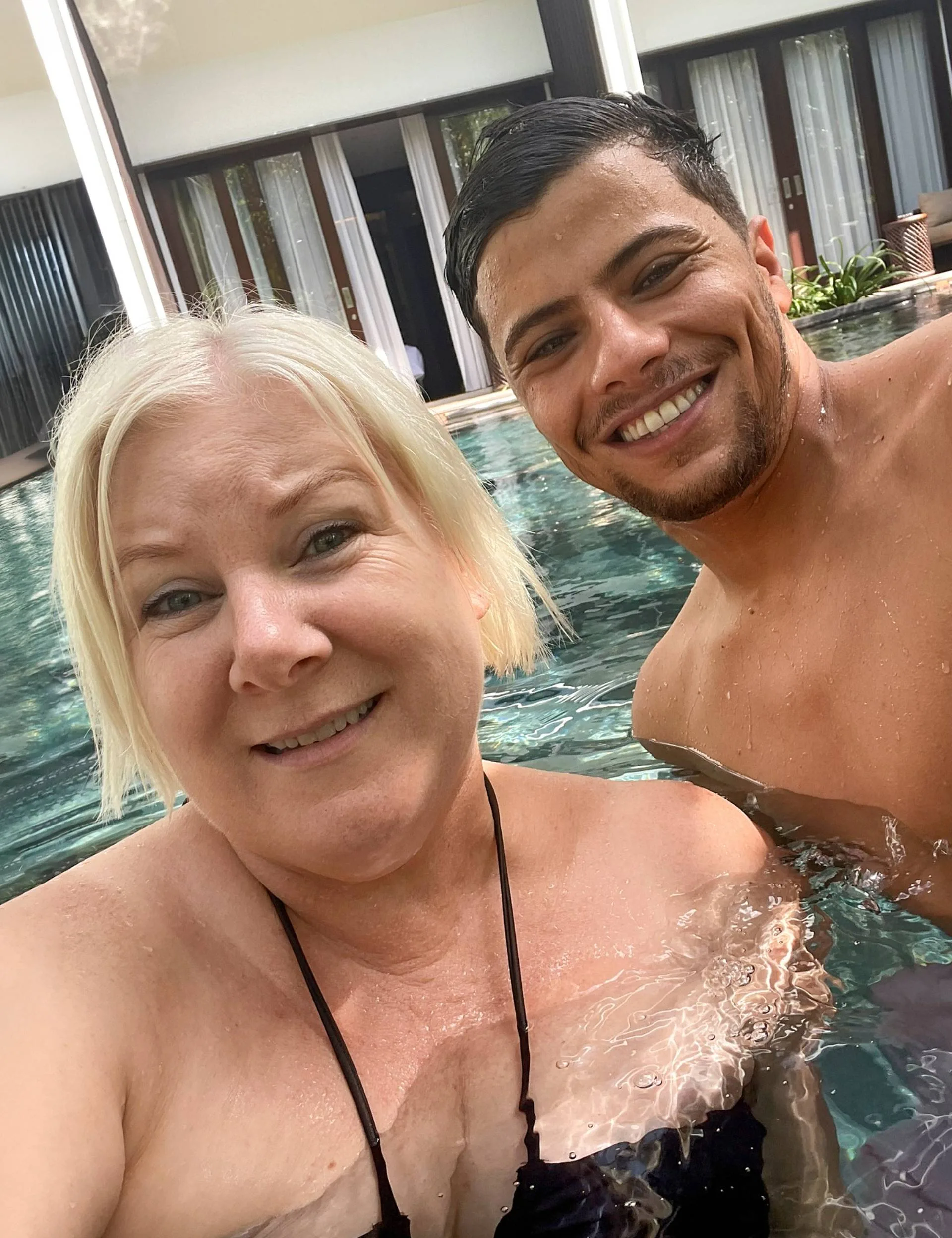 A selfie together in a pool