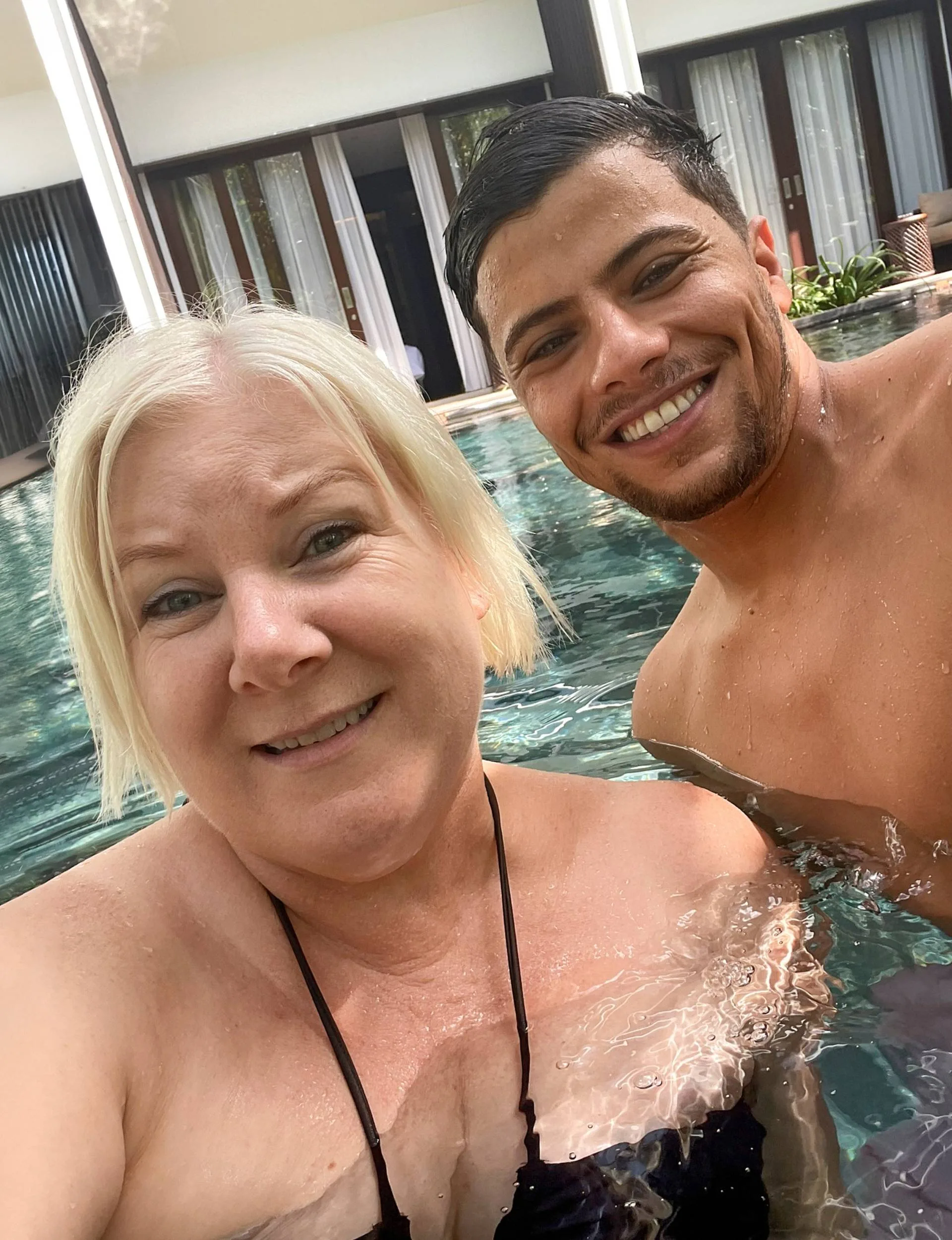 A selfie together in a pool