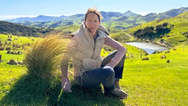 Rosie Dowling sitting on top of a hill