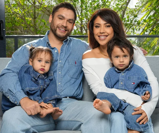 family of four wearing denim