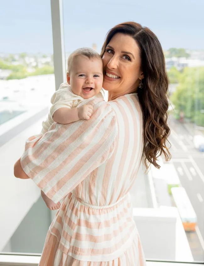 woman holding baby