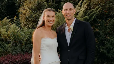 Married couple wearing black and white