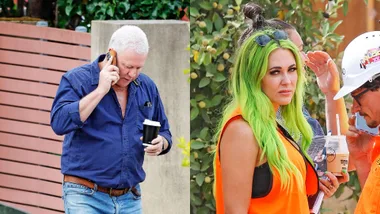 A middle-ages man on the phone, girl wearing high-vis vest, green hair