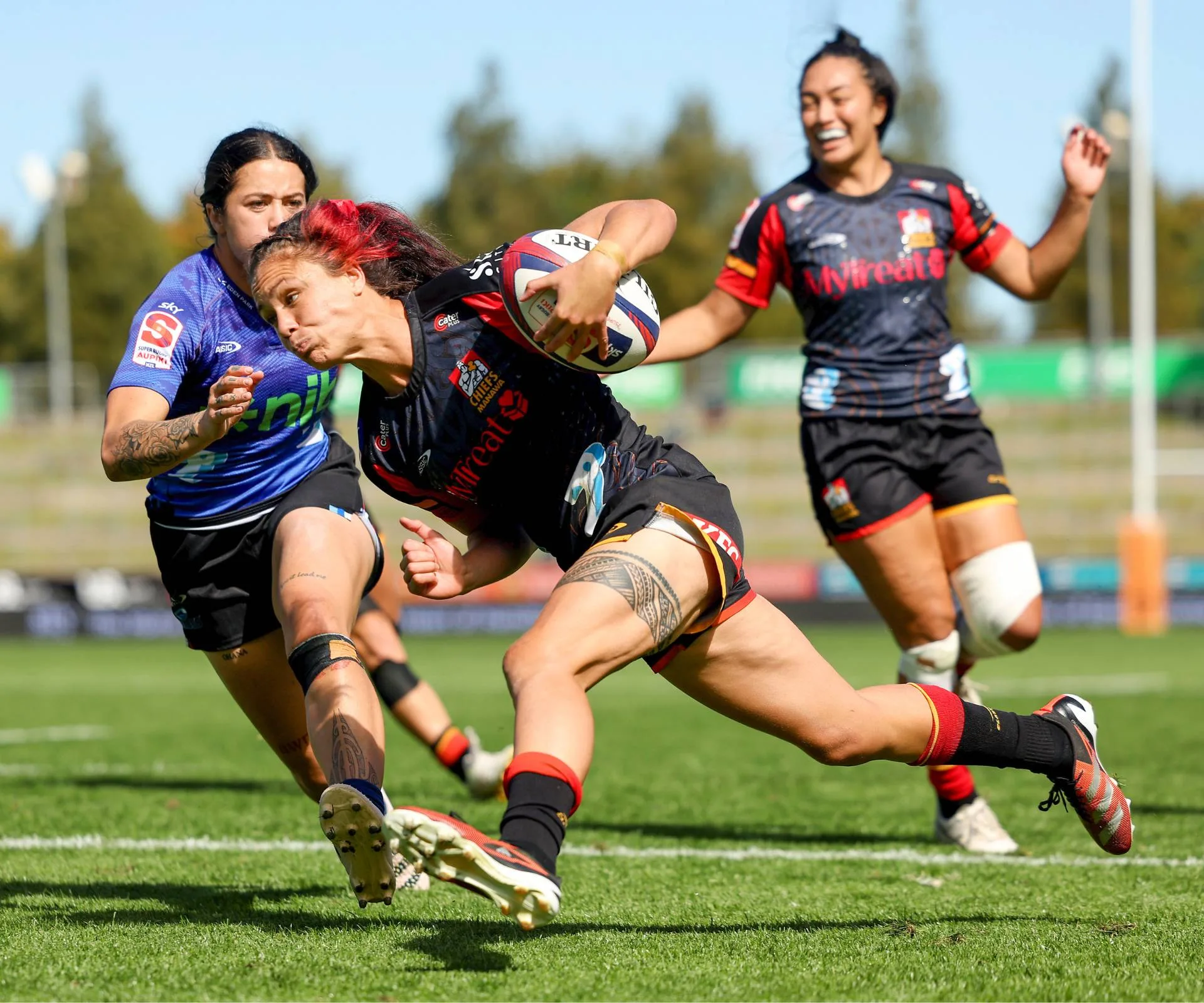 Scoring a try for the Chiefs Manawa team