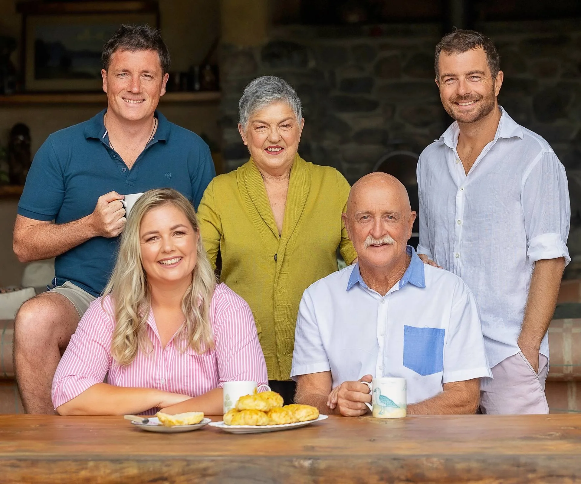 Alexa Cook sitting at a table with her family