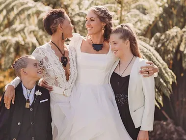 Brides Madeline and Kylie Wright with their kids