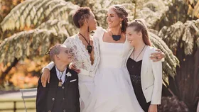 Brides Madeline and Kylie Wright with their kids