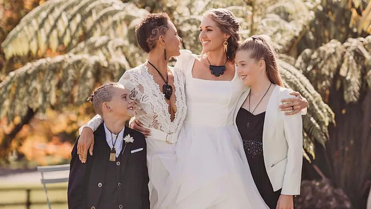 Brides Madeline and Kylie Wright with their kids