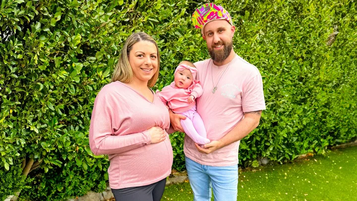 Haydn with his wife Chelsea and daughter Tilly while Chelsea shows off her second pregnancy