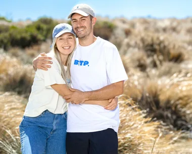 Jesse and Paige in front of sand dunes