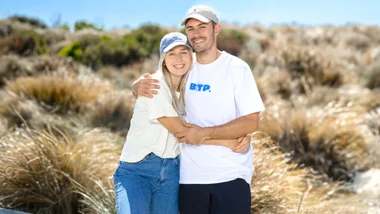 Jesse and Paige in front of sand dunes