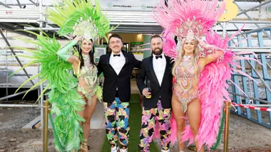 Ricky and Haydn with showgirls on set of The Block