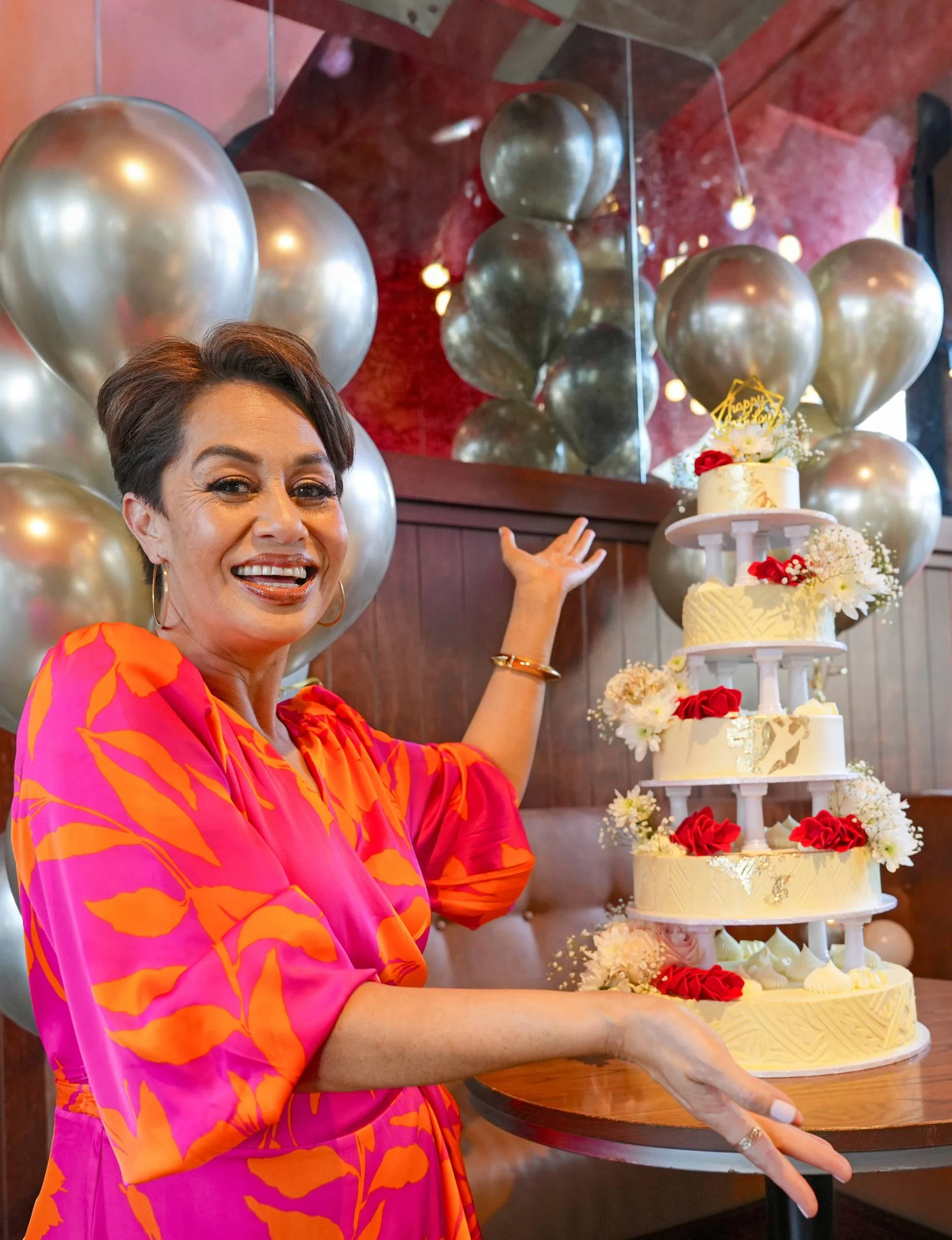 Teuila Blakely beside her fiftieth birthday cake