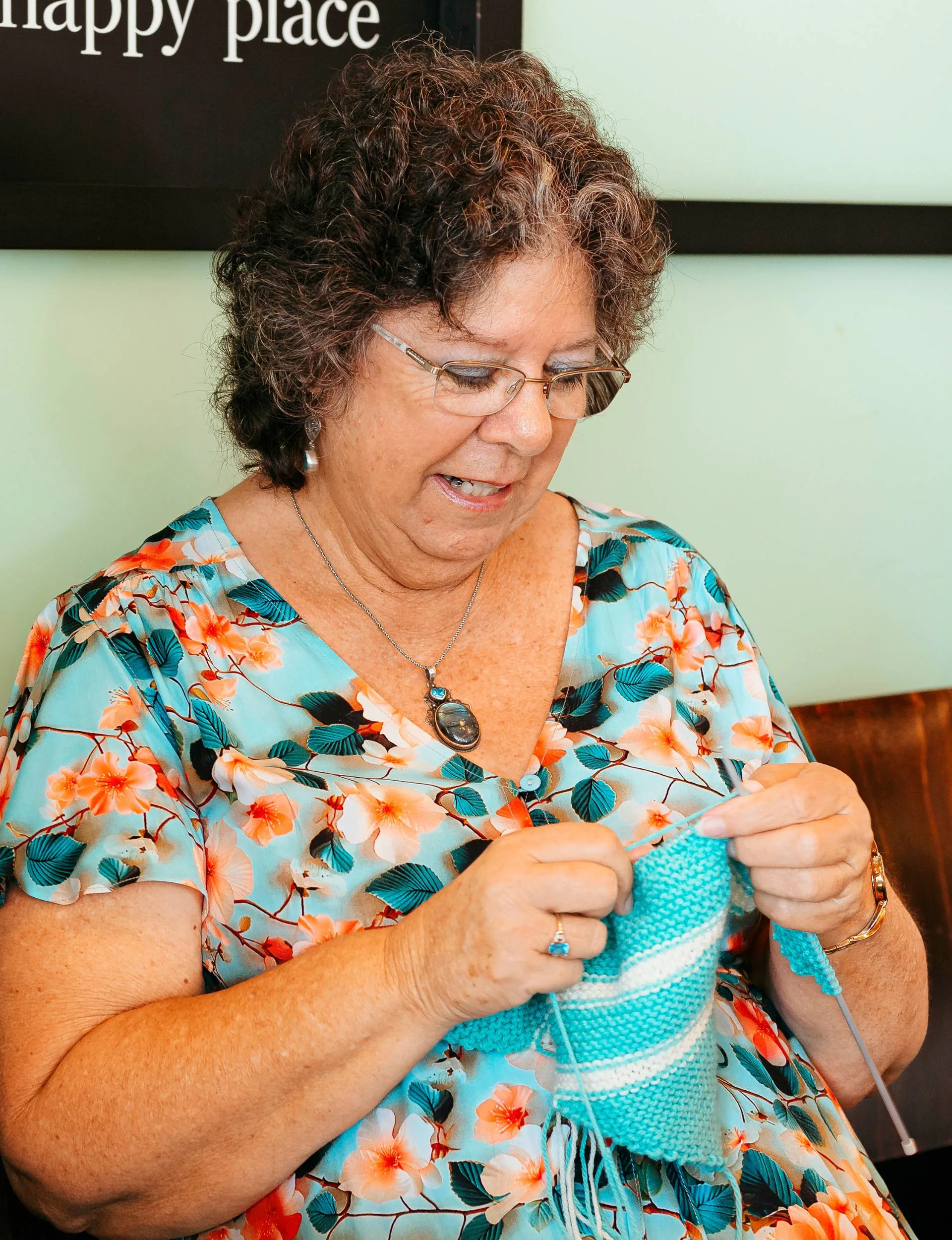 A member of the Yarnteeze knitting