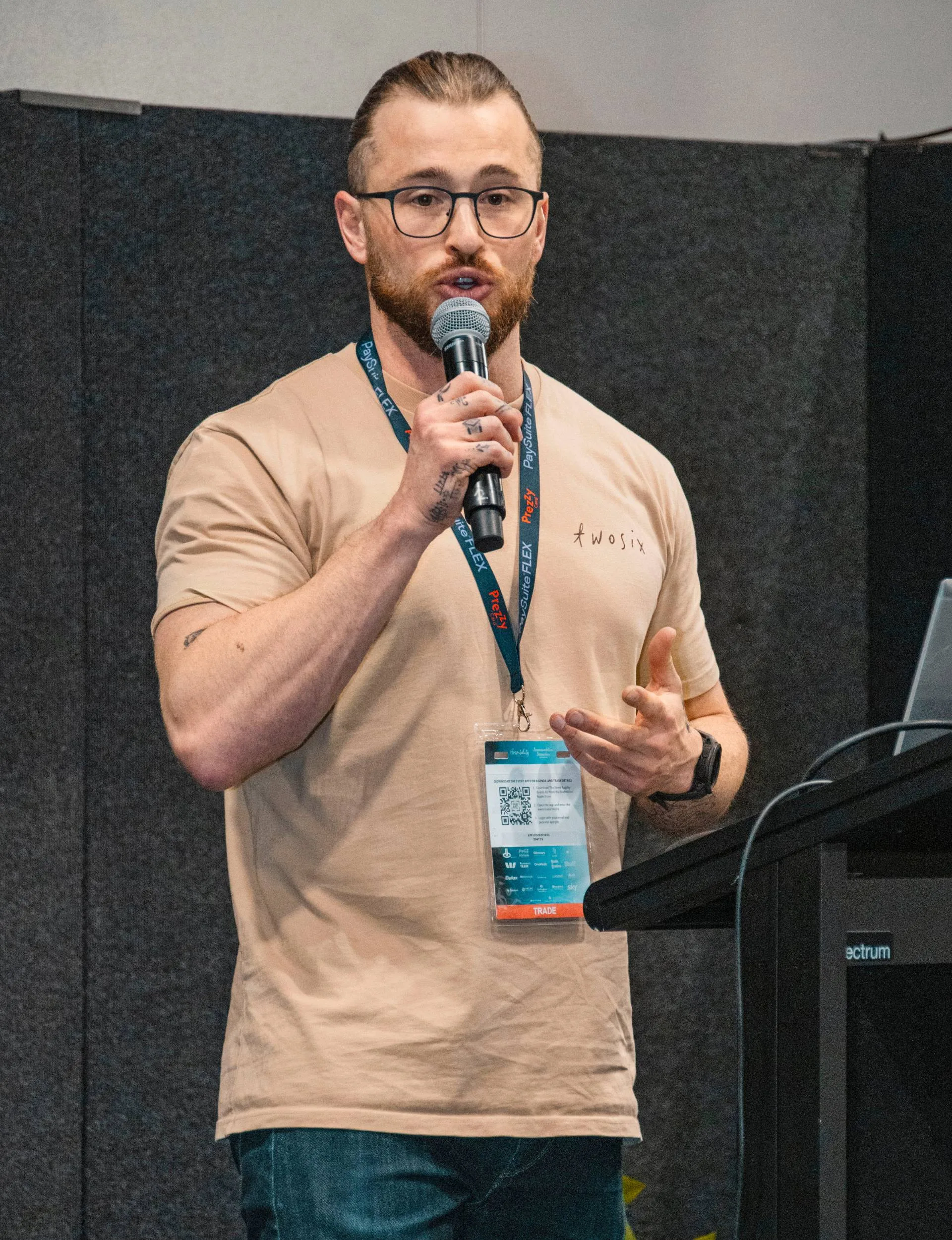 Joshua Fankhauser speaking into a microphone