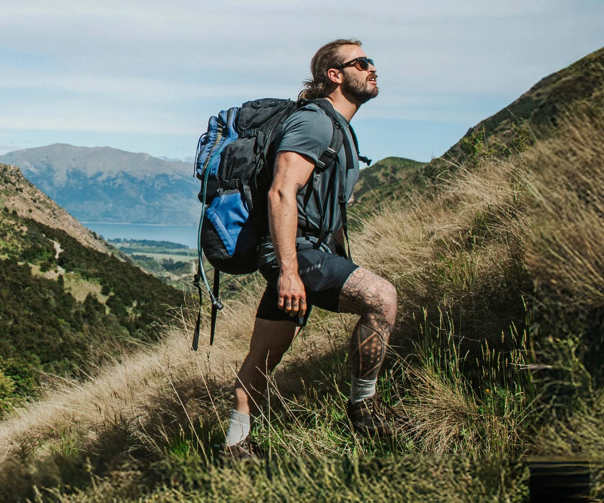 Joshua Fankhauser climbing up a mountain