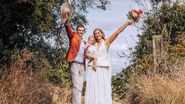 Storm Purvis with her husband and daughter at her wedding